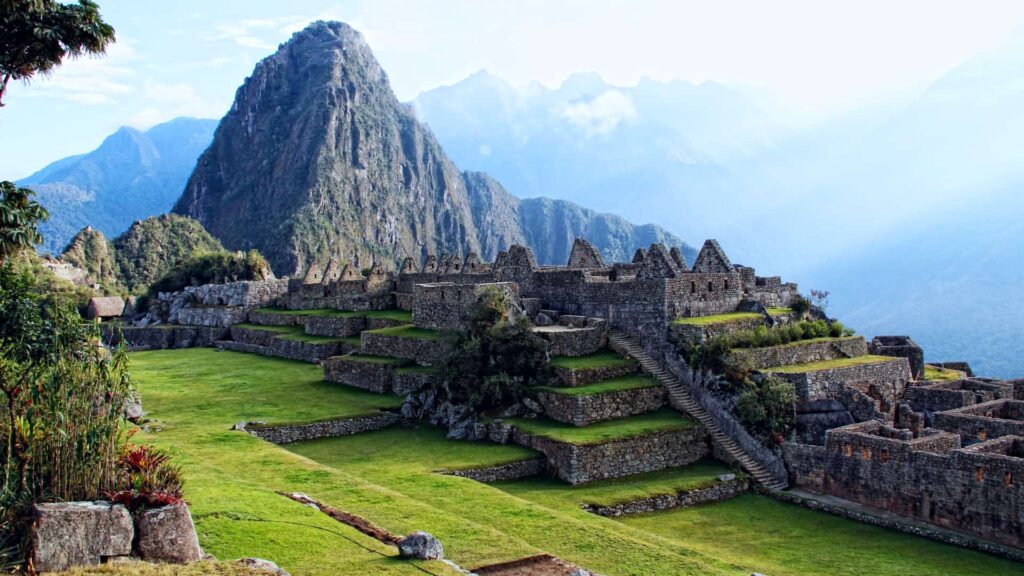Machu Picchu ruins and terraces with Huayna Picchu behind