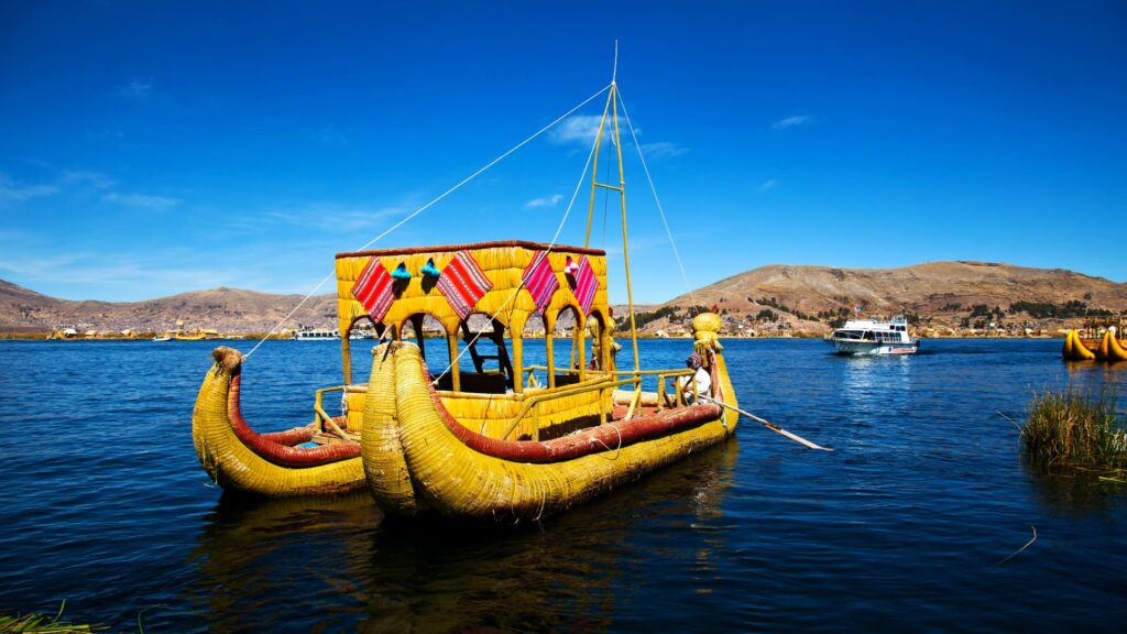 Reed boat decorated with woven textiles on Lake Titicaca